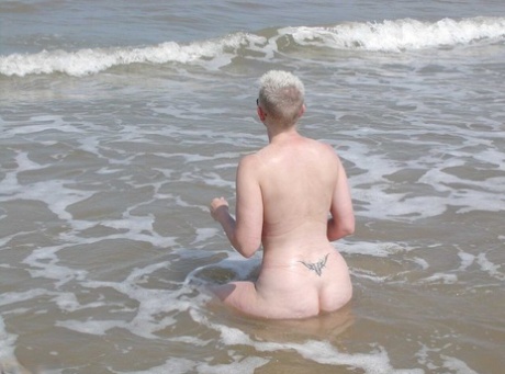 mature beach art naked images