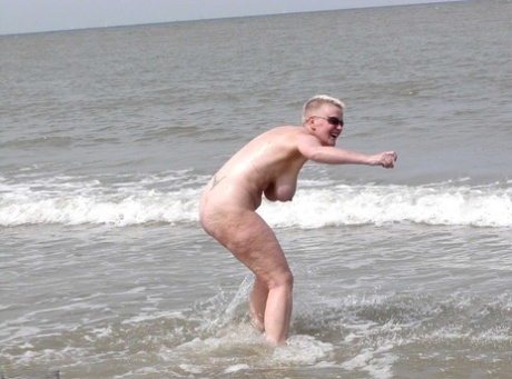 mature beach nude image