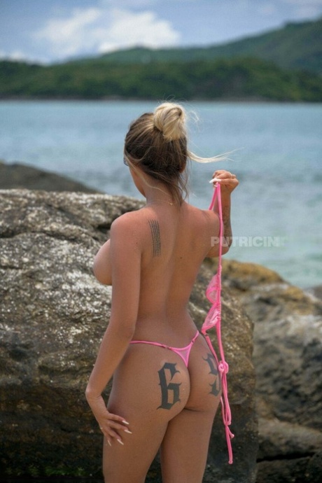 bikini bent over porn photo